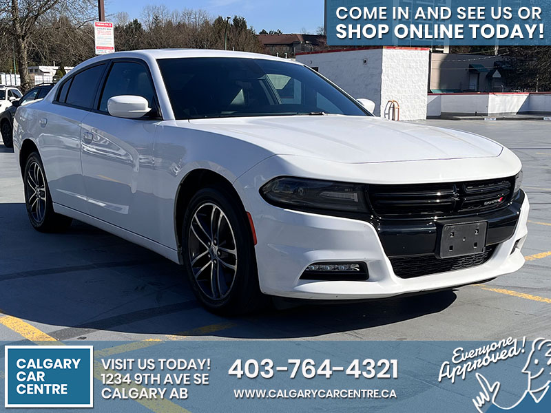 Used Sedan 2019 Dodge Charger White for sale in Calgary