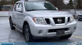 Used Crew Cab 2016 Nissan Frontier Silver for sale in Calgary