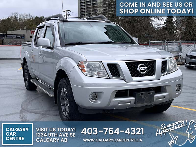 Used Crew Cab 2016 Nissan Frontier Silver for sale in Calgary